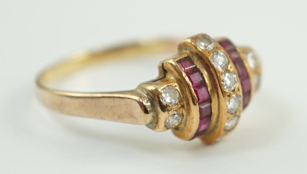 A 1950's gold and graduated five row ruby and diamond set demi lune dress ring